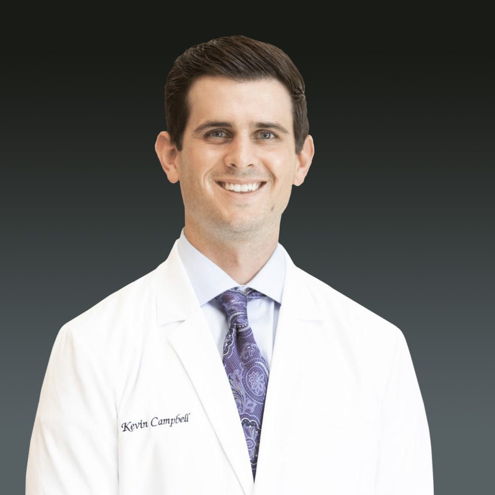 Dr Kevin Campbell at Optical Solutions Dr. Kevin Campbell wearing a white coat at Optical Solutions in Hilton Head Island and Bluffton, SC